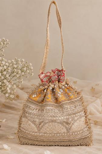 Mustard gold silk potli bag
