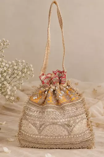 Mustard gold silk potli bag
