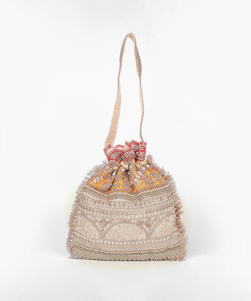 Mustard gold silk potli bag