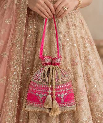 Pink gold silk potli bag 1