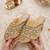Gold synthetic mojari heels