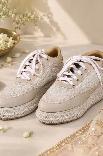 White synthetic beaded casual shoes