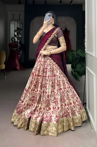 Women's Tussar Silk Floral Kalamkari Printed Lehenga Choli with Embroidered Border Dupatta