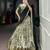 Women's Tussar Silk Floral Kalamkari Printed Lehenga Choli with Embroidered Border Dupatta