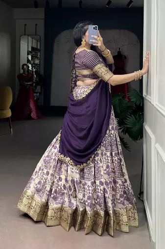 Women's Tussar Silk Floral Kalamkari Printed Lehenga Choli with Embroidered Border Dupatta