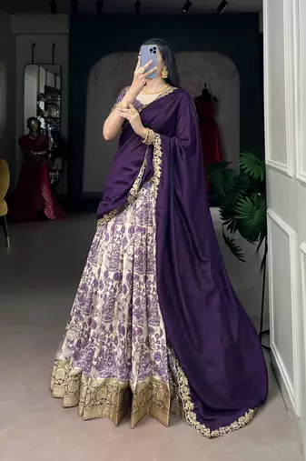 Women's Tussar Silk Floral Kalamkari Printed Lehenga Choli with Embroidered Border Dupatta