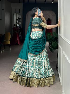 Women's Tussar Silk Floral Kalamkari Printed Lehenga Choli with Embroidered Border Dupatta 1