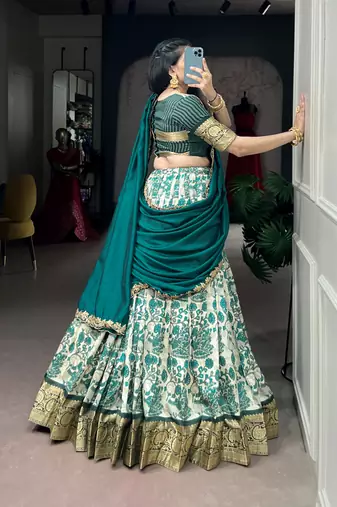 Women's Tussar Silk Floral Kalamkari Printed Lehenga Choli with Embroidered Border Dupatta