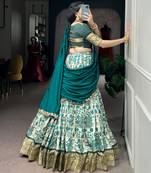 Women's Tussar Silk Floral Kalamkari Printed Lehenga Choli with Embroidered Border Dupatta