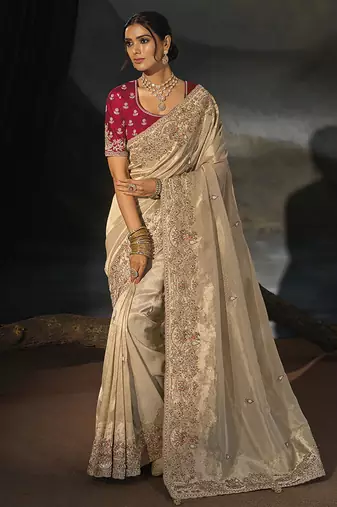 chiku kanjivaram saree with jari thread moti and cut dana heavy hand work
