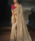 chiku kanjivaram saree with jari thread moti and cut dana heavy hand work