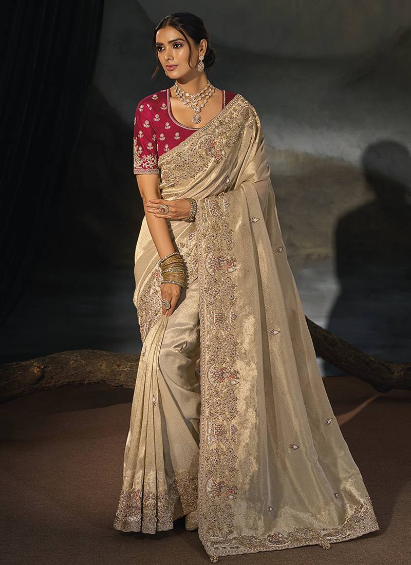 chiku kanjivaram saree with jari thread moti and cut dana heavy hand work