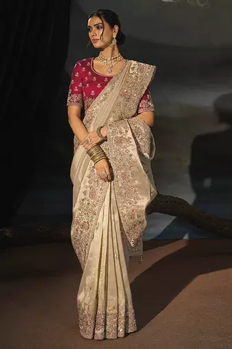 chiku kanjivaram saree with jari thread moti and cut dana heavy hand work