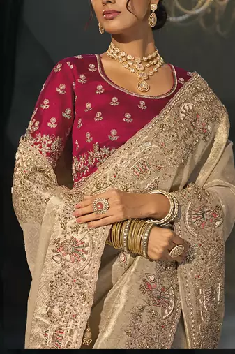 chiku kanjivaram saree with jari thread moti and cut dana heavy hand work
