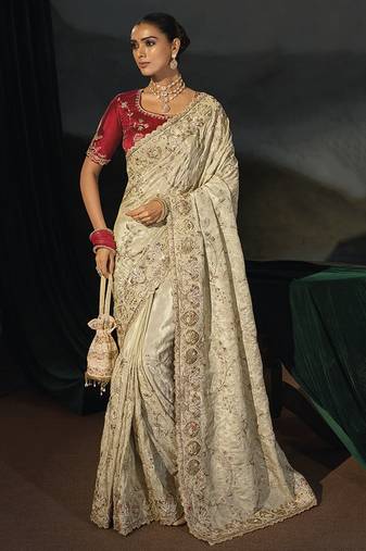 cream kanjivaram saree with jari thread moti cut dana and moti heavy hand work