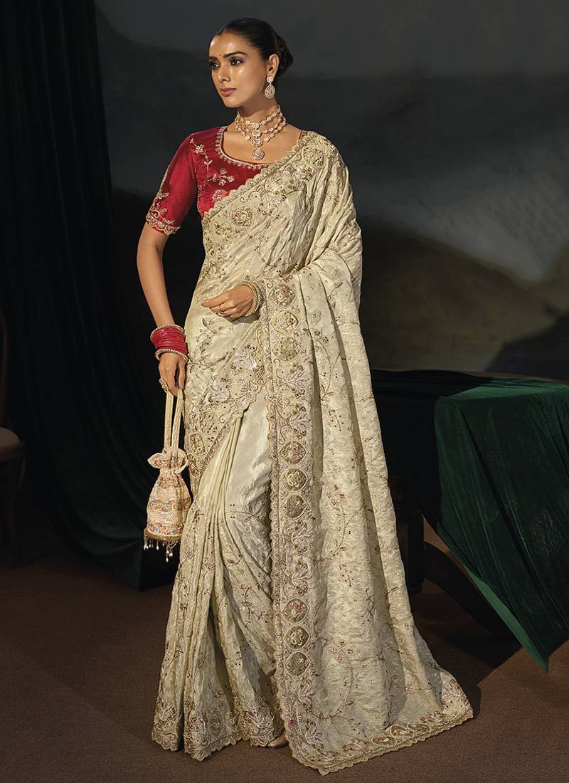 cream kanjivaram saree with jari thread moti cut dana and moti heavy hand work