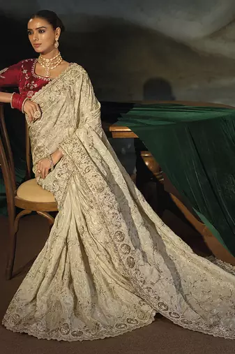 cream kanjivaram saree with jari thread moti cut dana and moti heavy hand work