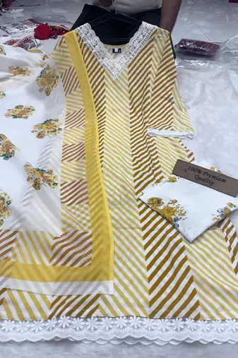 Yellow printed rayon cotton suit set with lace work