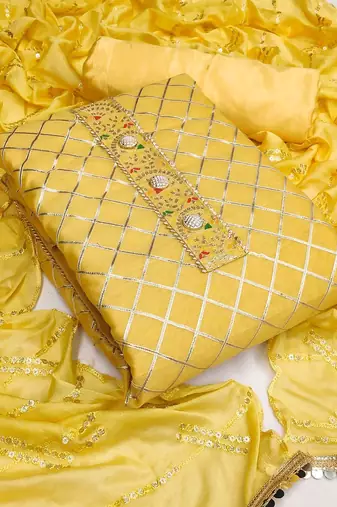 yellow & silver-toned embroidered unstitched dress material