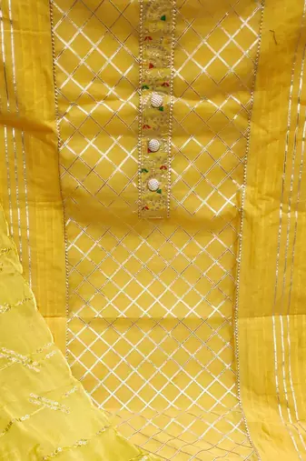yellow & silver-toned embroidered unstitched dress material