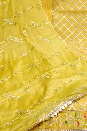 yellow & silver-toned embroidered unstitched dress material