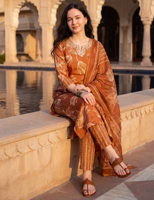 Orange printed cotton blend kurta trouser dupatta set 1