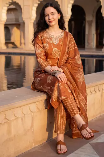 Orange printed cotton blend kurta trouser dupatta set