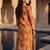 Orange printed cotton blend kurta trouser dupatta set