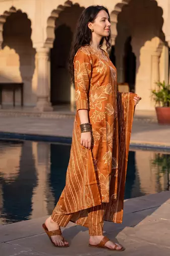 Orange printed cotton blend kurta trouser dupatta set