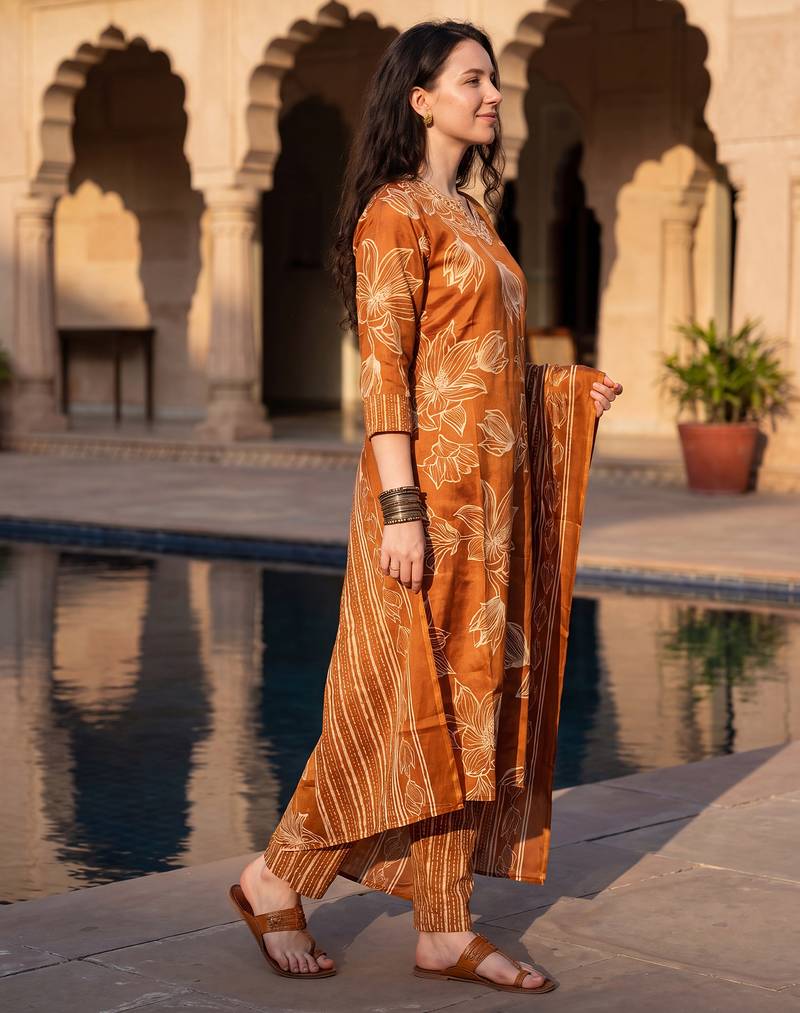 Orange printed cotton blend kurta trouser dupatta set