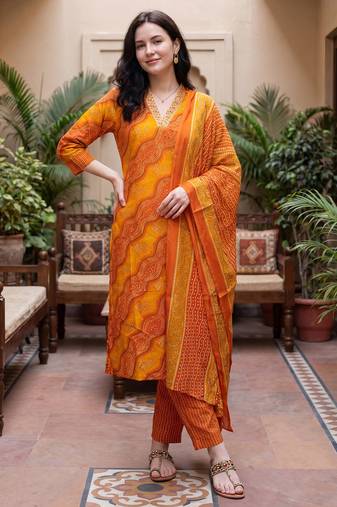 Orange printed cotton blend kurta trouser dupatta set