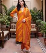 Orange printed cotton blend kurta trouser dupatta set