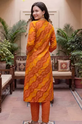 Orange printed cotton blend kurta trouser dupatta set