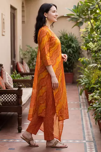 Orange printed cotton blend kurta trouser dupatta set