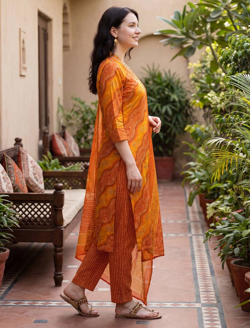 Orange printed cotton blend kurta trouser dupatta set