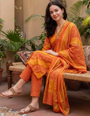 Orange printed cotton blend kurta trouser dupatta set 4