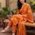 Orange printed cotton blend kurta trouser dupatta set
