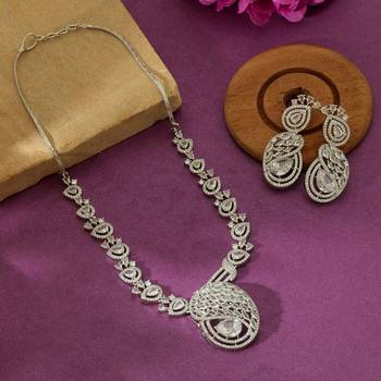 Sleek metallic silver color american diamond necklace set designed for formal partywear 1