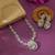 Sleek metallic silver color american diamond necklace set designed for formal partywear