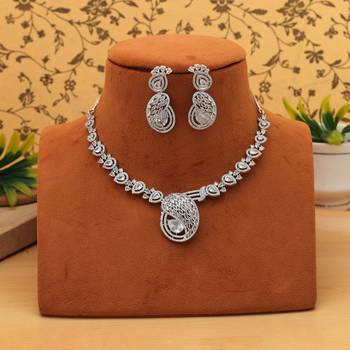 Sleek metallic silver color american diamond necklace set designed for formal partywear 2