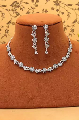 Radiant fine silver color american diamond necklace set created for formal evening gatherings
