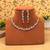 Radiant fine silver color american diamond necklace set created for formal evening gatherings