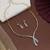 Crystal clear white color american diamond necklace set styled for evening functions