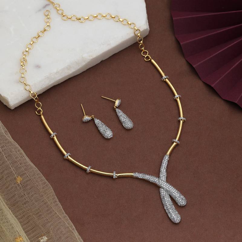 Crystal clear white color american diamond necklace set styled for evening functions