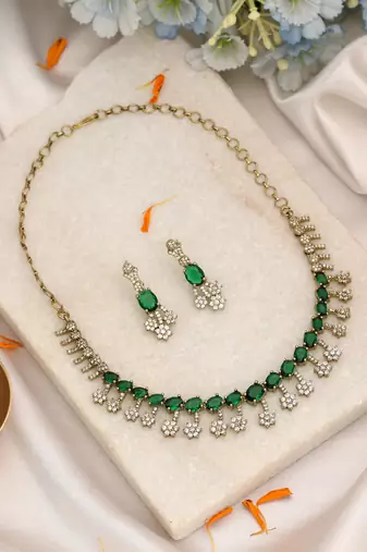 Lush emerald green color american diamond necklace set tailored for ethnic sarees