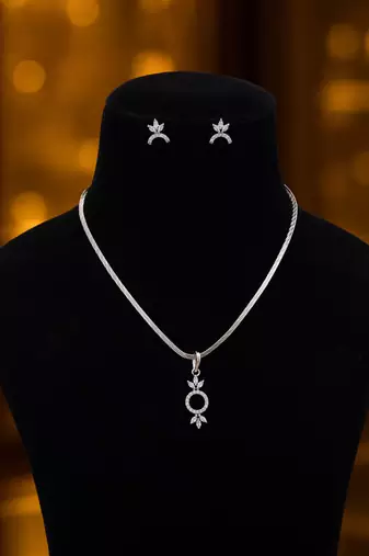 Shimmering fine silver color american diamond necklace set ideal for formal gatherings