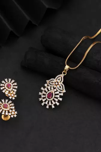 Vivid hot rani color american diamond pendant set designed for sangeet celebrations