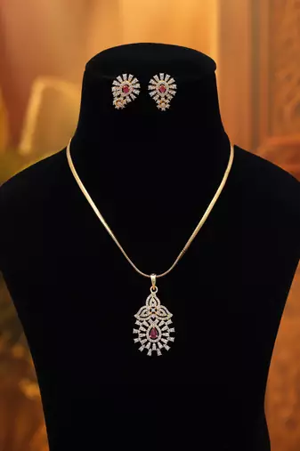 Vivid hot rani color american diamond pendant set designed for sangeet celebrations