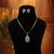 Vivid hot rani color american diamond pendant set designed for sangeet celebrations