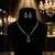 Radiant olive green color american diamond pendant set ideal for traditional outfits